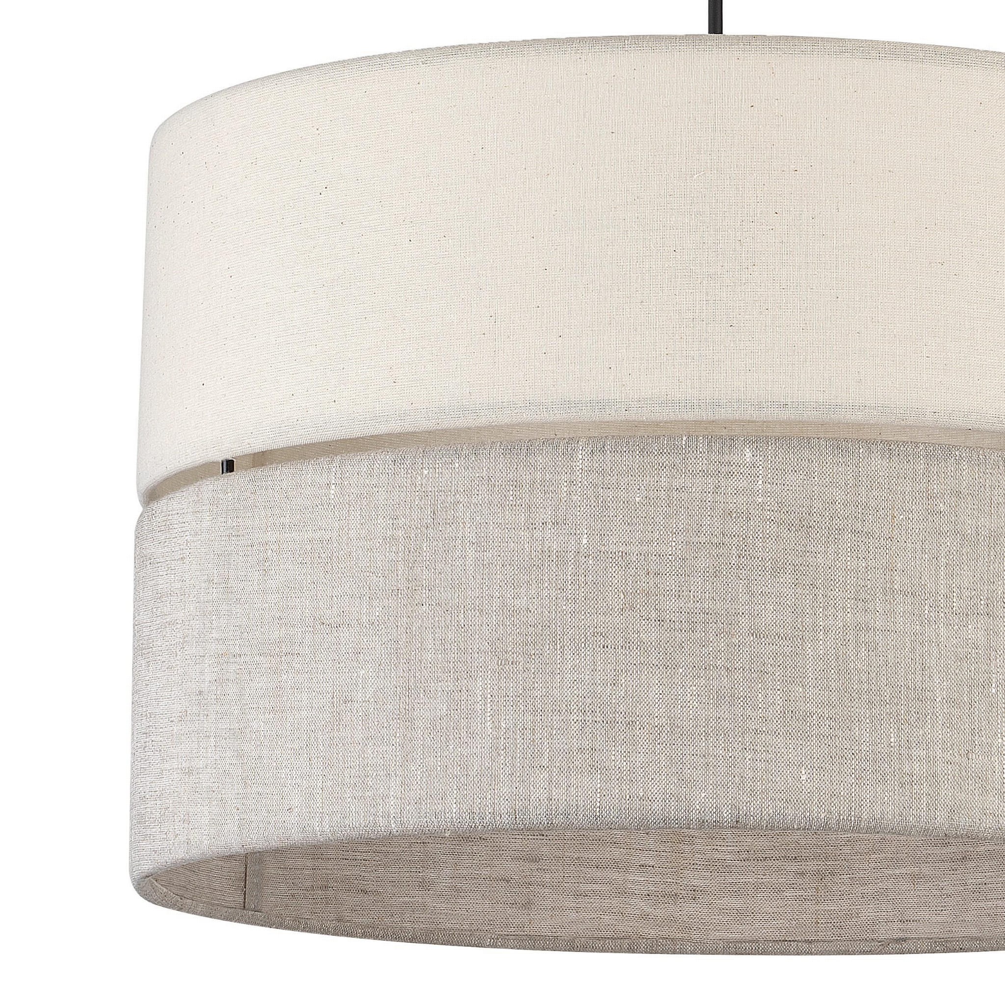 Lampa wisząca Eco D38 w kolorze jasnym, składająca się z dwóch cylindrycznych abażurów: górny w odcieniu białym, dolny w odcieniu szarym. Ujęcie z góry, pokazujące teksturę materiału. Produkt przeznaczony do oświetlenia pomieszczeń.