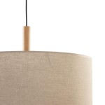 Lampa wisząca Deva Nature 1-punktowa 6107 z okrągłym kloszem w jasnym odcieniu beżu, wykonana z tkaniny. U góry znajduje się drewniany element montażowy. Produkt zawieszony na czarnym przewodzie.