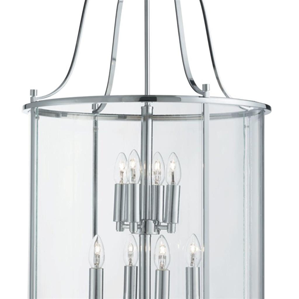 Lampa wisząca Lantern Grande w chromie, 12-punktowa, z przezroczystym kloszem. Widoczna konstrukcja z metalowymi elementami i szklanym wykończeniem, z oświetleniem w formie eleganckich żarówek. Ujęcie z góry, pokazujące detal i kształt lampy.