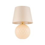 Lampa stołowa Santana 1-punktowa w kolorze ekri. Okrągła podstawa z fakturowanego szkła w odcieniu jasnego beżu, zakończona beżowym abażurem. Stojąca, z widocznym złotym elementem mocującym. Idealna do użytku w domowych wnętrzach.