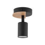 Lampa sufitowa Cover Wood 1-punktowa, czarna. Cylindryczny klosz z matowego metalu, zawieszony na drewnianej podstawie. Ujęcie z dołu, z widocznym światłem w dolnej części klosza. Prosty, nowoczesny design, idealna do różnych wnętrz.