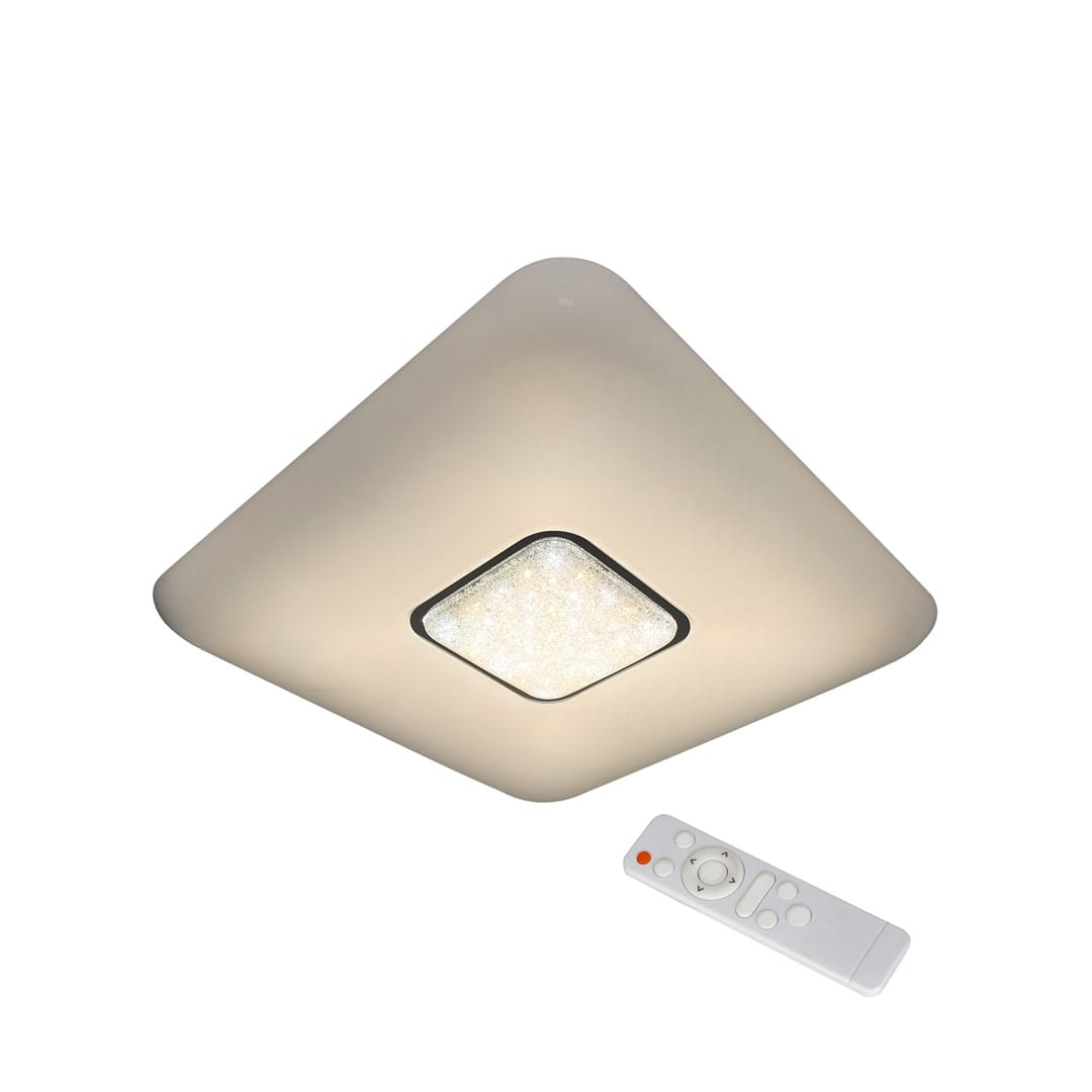 Plafon Yax LED D44/24W w kształcie kwadratu, z białą matową obudową i centralnym panelem LED. Zestaw zawiera pilot do regulacji jasności i temperatury barwowej (3000-6000K). Ujęcie z góry, produkt zamontowany na suficie.