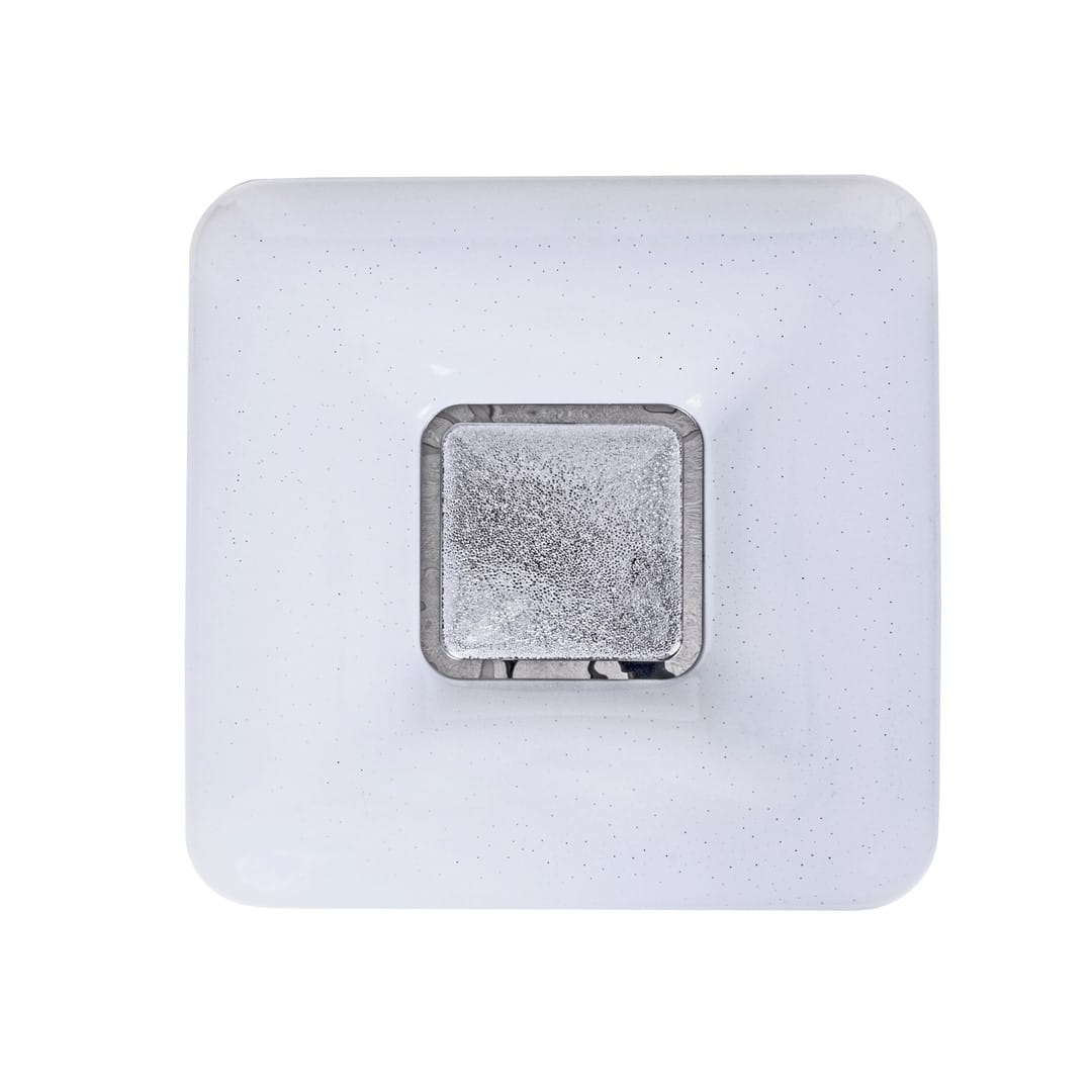 Plafon Yax LED D44/24W w kształcie kwadratu, z białą, lekko teksturowaną obudową i metalowym, srebrnym detalem na środku. Produkt z możliwością ściemniania, z pilotem, o temperaturze barwowej 3000-6000K. Ujęcie z góry.