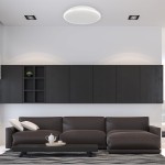 Plafon LED Terma D28 o mocy 18W i barwie światła 4000K, w kolorze białym. Okrągły kształt, zamontowany na suficie, idealny do nowoczesnych wnętrz. Oświetlenie IP44, odporne na wilgoć. Ujęcie frontalne w minimalistycznej aranżacji z ciemnymi meblami.