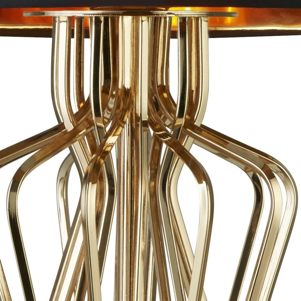 Lampa stołowa Ethan 1-punktowa w kolorze złotym, z unikalnym, dekoracyjnym wzorem podstawy z metalowych, falowanych prętów. Widoczny detal górnej części z czarnym kloszem, podkreślającym elegancki design.