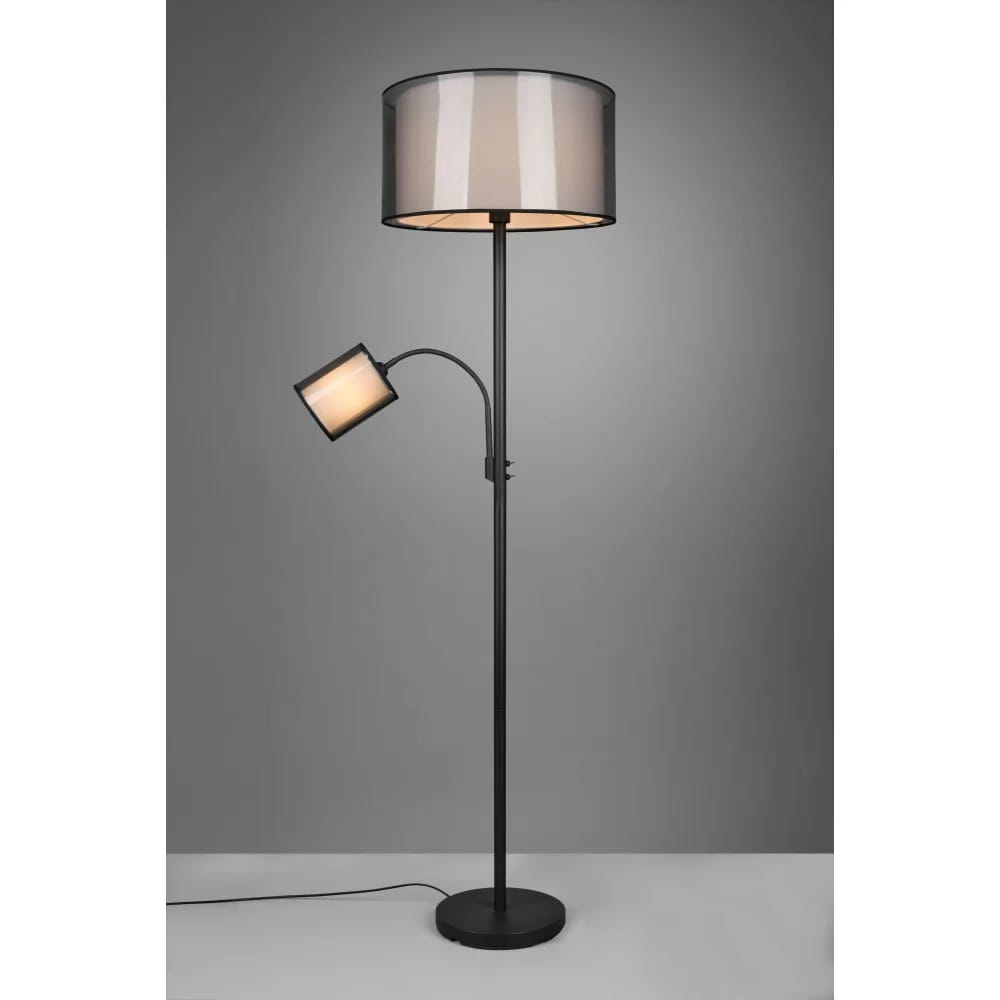 Lampa podłogowa Burton 2-punktowa w kolorze czarnym. Posiada okrągły klosz z przezroczystym wykończeniem oraz dodatkową, ruchomą lampkę w formie prostokątnej, umieszczoną na giętym ramieniu. Stojąca, z okrągłą podstawą.