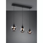 Lampa wisząca Lumina 3-punktowa w kolorze czarnym i chromowanym, z trzema różnymi kloszami w kształcie kropli, zawieszona na czarnej listwie. Klosze mają połyskujące wykończenie, a wewnątrz widoczne żarówki. Tło w odcieniu szarości.