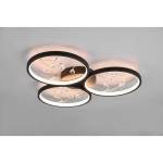 Czarna lampa sufitowa LED Groovy 3000K, trzy okrągłe klosze z przezroczystymi dekoracjami i złotymi akcentami, zamontowana na suficie. Widoczna miękka iluminacja, elegancki design, idealna do nowoczesnych wnętrz.