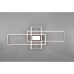 Czteropunktowa lampa sufitowa Irvine w kolorze mosiądzu i czerni, z pilotem. Kształt składa się z geometrycznych ramek o białym wykończeniu, umieszczonych na szarym tle. Produkt montowany sufitowo, idealny do nowoczesnych wnętrz.