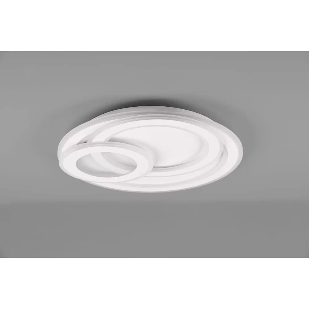 Biała lampa sufitowa LED 3-punktowa Mita z pilotem, o okrągłych, minimalistycznych kształtach, zamontowana na szarym tle. Widoczne trzy pierścienie o różnej średnicy, tworzące nowoczesny design.