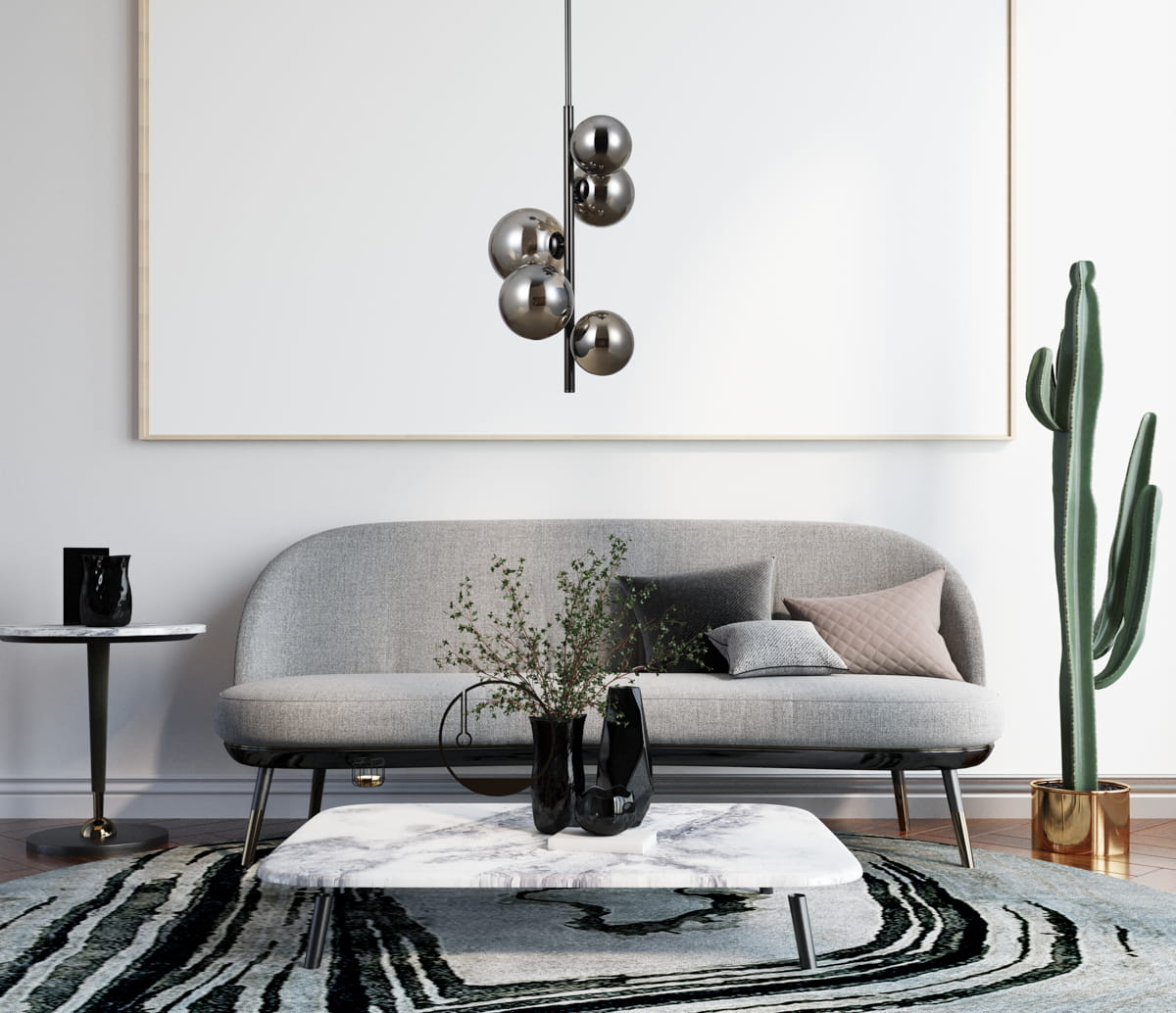 Lampa wisząca Canello, 5-punktowa, w kolorze czarnego chromu z dymionymi kloszami, zawieszona nad stolikiem kawowym. W tle szara sofa, roślina i minimalistyczna dekoracja na ścianie.