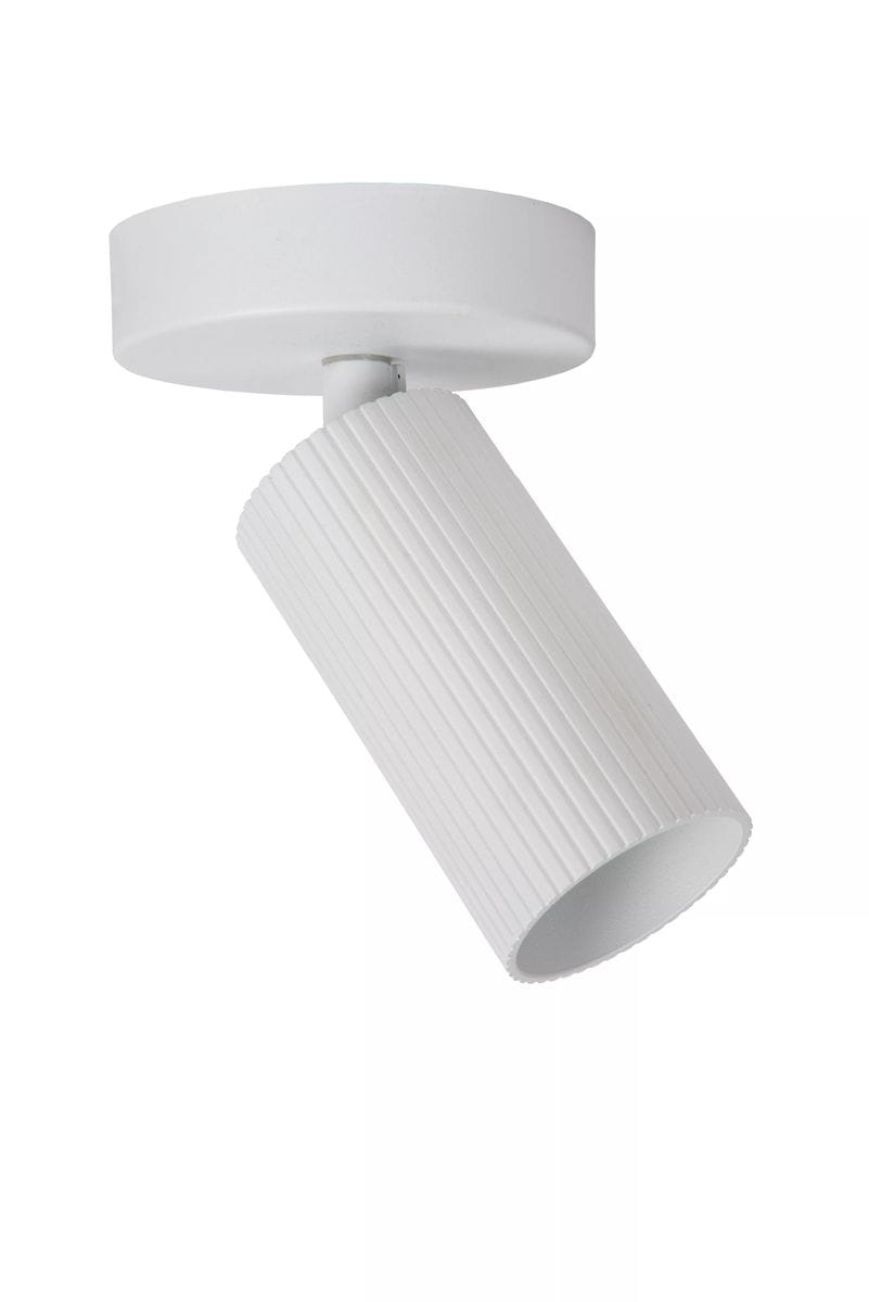 Biała lampa sufitowa (spot) 1-punktowa Clubs o cylindrycznym kształcie z fakturą żłobkowaną, montowana do sufitu. Ujęcie z boku, z widocznym okrągłym mocowaniem. Idealna do nowoczesnych wnętrz.