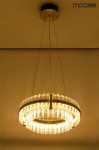 Lampa wisząca Saturnus Due LED o średnicy 47 cm, w złotym kolorze, z transparentnymi elementami szklanymi. Posiada okrągły kształt, zawieszona na cienkich kablach, emitująca ciepłe światło. Montaż sufitowy, idealna do nowoczesnych wnętrz.