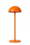 Pomarańczowa lampa stołowa Joy LED, z okrągłą podstawą i zaokrąglonym kloszem, stojąca w pozycji pionowej. Prosta, nowoczesna forma, wykonana z metalu, idealna do użytku zewnętrznego. Na jednolitym tle, bez dodatkowych elementów.