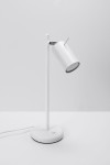 Biała lampka biurkowa SL1090 z cylindrycznym kloszem, umieszczona na okrągłej podstawie. Klosz jest regulowany, a na podstawie znajduje się przycisk zasilania. Produkt stoi na gładkiej, jasnej powierzchni.