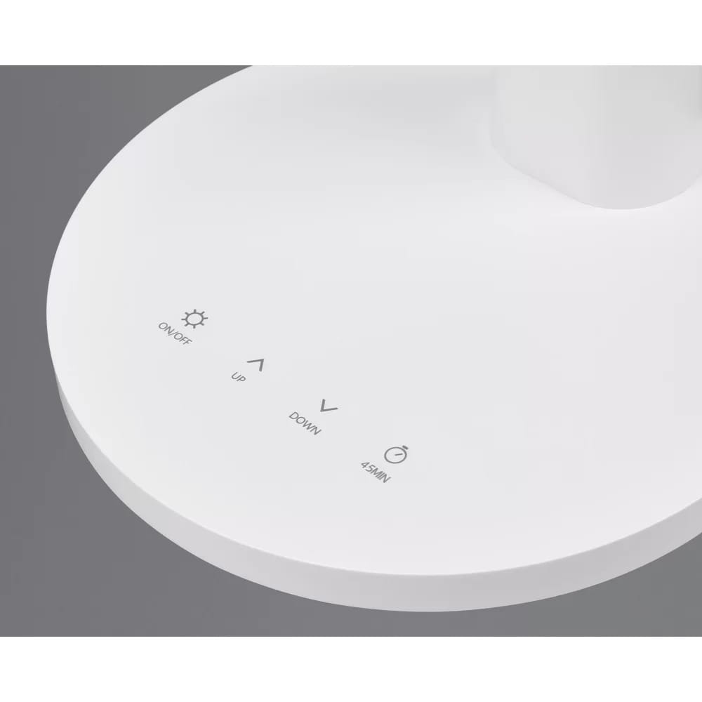 Biała lampa biurkowa Sally LED z okrągłą podstawą, widoczne przyciski: ON/OFF, UP, DOWN, 45MIN. Ujęcie z góry, prezentujące detale panelu sterowania.