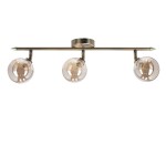 Lampa sufitowa Rodia 3-punktowa w kolorze patyny z bursztynowymi kloszami. Ułożona poziomo, z trzema przezroczystymi kulami, każda z widoczną żarówką. Metalowy stelaż z ozdobnymi końcówkami, montowana do sufitu.