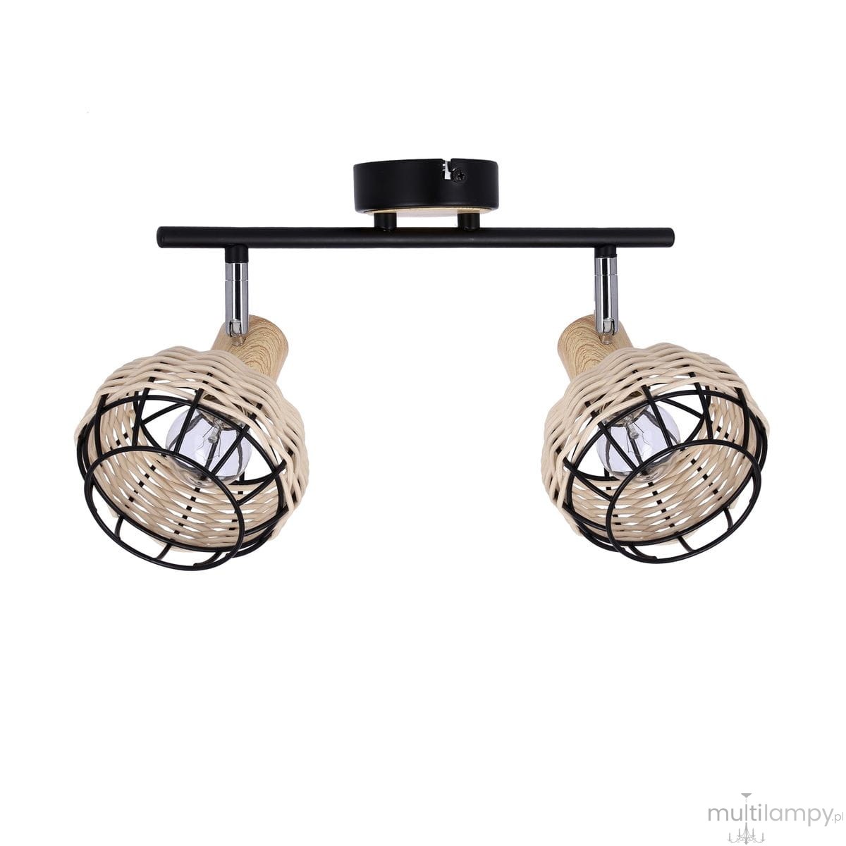Dwupunktowa lampa sufitowa Tajga w kolorze czarnym i rattanowym. Posiada dwa klosze z plecionki rattanowej z metalową siatką, umieszczone na prostokątnej, czarnej podstawie. Produkt zamontowany na suficie, idealny do nowoczesnych wnętrz.