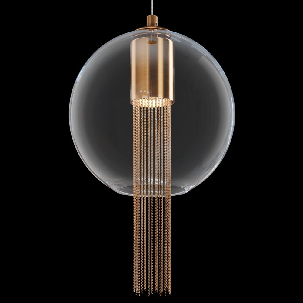 Lampa wisząca Flusso 1-punktowa w kolorze brązowym. Okrągła, przezroczysta kula szklana z metalowym, złotym elementem u góry oraz wiszącymi łańcuszkami poniżej, zawieszona na cienkim przewodzie. Tło czarne.