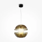Lampa wisząca Rebel LED w kolorze złotym i bursztynowym z dwoma przezroczystymi kloszami, w których umieszczona jest okrągła, biała żarówka. Zawieszona na cienkim, metalowym kablu z czarnym mocowaniem sufitowym.