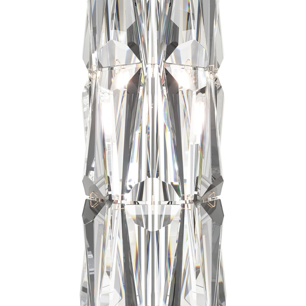 Lampa stołowa Puntes MOD043TL-02G w złotym kolorze, z dwoma punktami świetlnymi. Wykonana z kryształowego materiału, o geometrycznym kształcie i błyszczącej powierzchni. Ujęcie frontalne, ukazujące detale konstrukcji i refleksy świetlne.