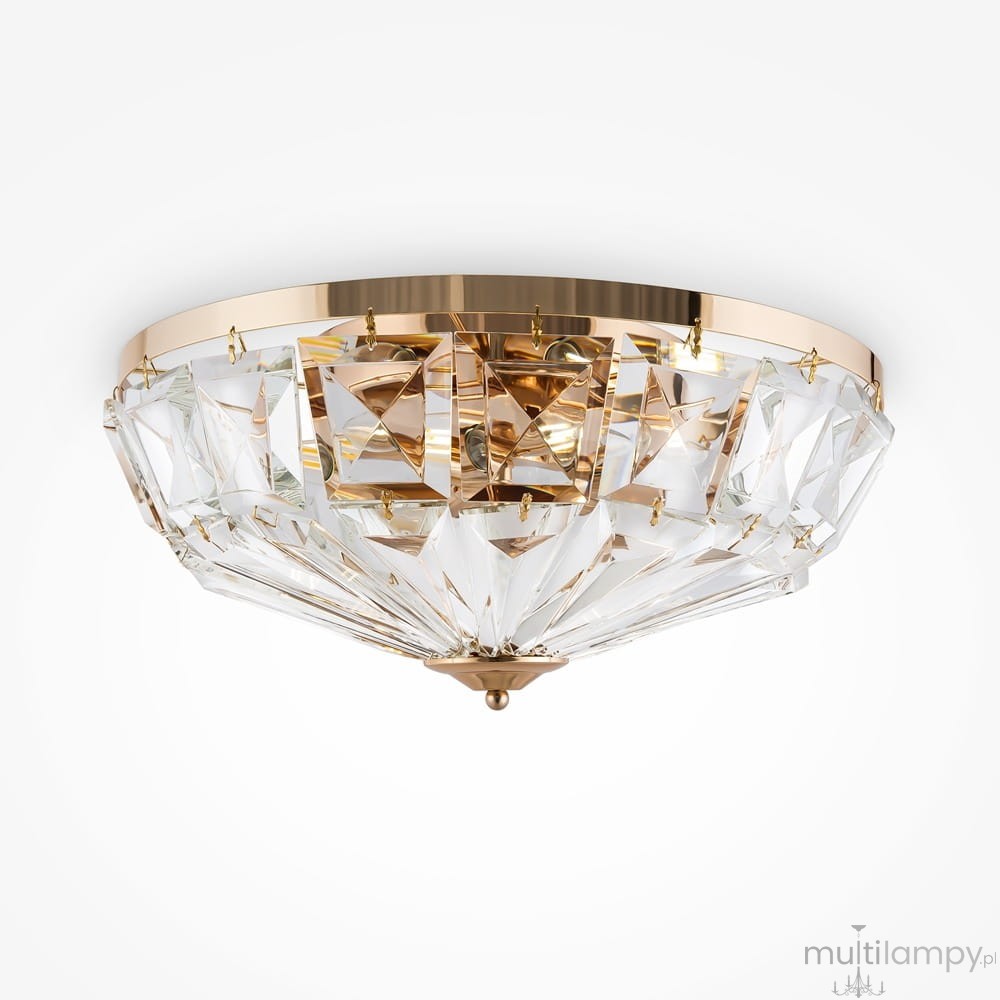 Złota lampa sufitowa Facet, 6-punktowa, z efektem kryształowego klosza w geometrycznym kształcie. Wysoka połyskliwość, metaliczne detale, montaż sufitowy, elegancki design, idealna do nowoczesnych wnętrz.
