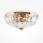 Złota lampa sufitowa Facet, 6-punktowa, z efektem kryształowego klosza w geometrycznym kształcie. Wysoka połyskliwość, metaliczne detale, montaż sufitowy, elegancki design, idealna do nowoczesnych wnętrz.