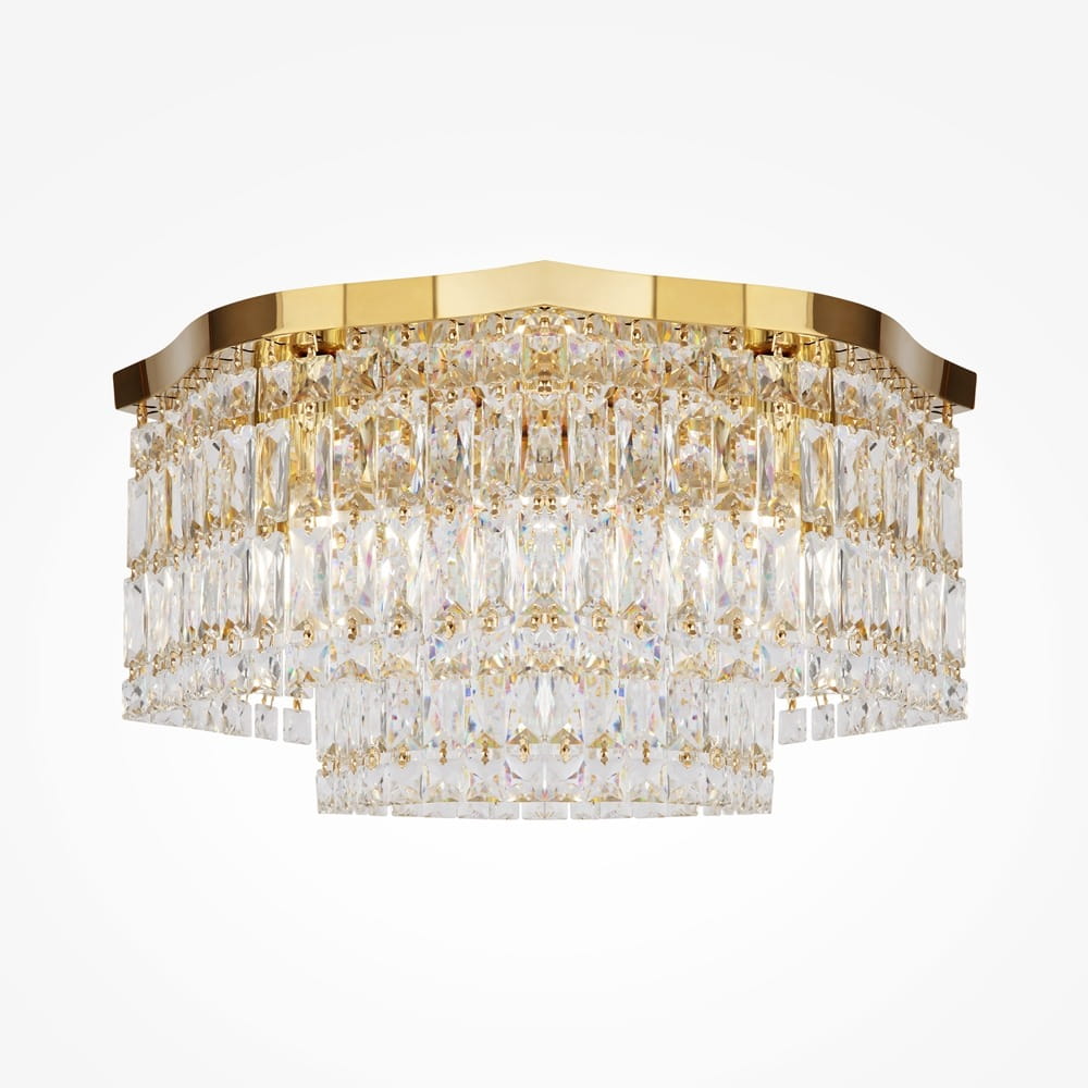 Złota lampa sufitowa Dune z sześcioma punktami świetlnymi. Ozdobiona przezroczystymi kryształkami w formie prostokątów, z lekko falującą krawędzią, montowana na suficie, z eleganckim wykończeniem w stylu glamour.