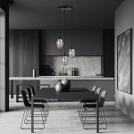 Lampa wisząca Astral 3-punktowa w kolorze czarnym i grafitowym, zawieszona nad stołem w nowoczesnej kuchni. Szklane klosze w kształcie kul, metalowe mocowanie, minimalistyczny styl. Otoczenie w odcieniach szarości i czerni.