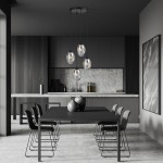 Lampa wisząca Astral 4-punktowa w kolorze czarnym i grafitowym, z czterema szklanymi kloszami w kształcie elipsy, zawieszona na cienkich linkach. Produkt umieszczony nad czarnym stołem w nowoczesnej kuchni, w tle szare szafki i blaty.