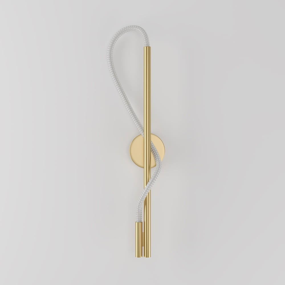 Kinkiet LED Tau 1-punktowy w kolorze złotym, z metalowym korpusem i elastycznym przewodem w białym oplocie. Produkt montowany na ścianie, z cylindrycznym źródłem światła na dole, prezentujący nowoczesny i minimalistyczny design.