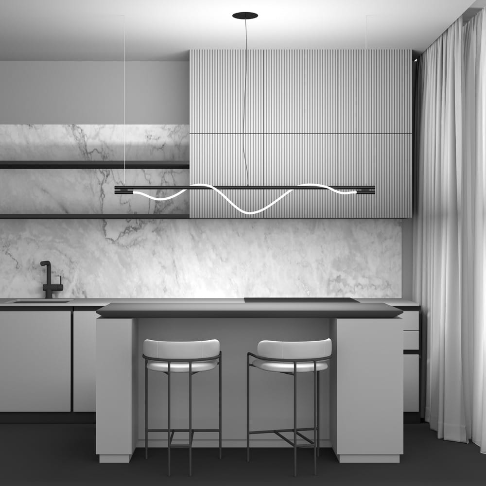 Złota lampa wisząca Tau LED MOD166PL-L20G3K, zamontowana nad wyspą kuchenną, o minimalistycznym designie i falistym kształcie. Lampa jest zawieszona na cienkim przewodzie, w otoczeniu nowoczesnych, białych mebli i marmurowego tła.