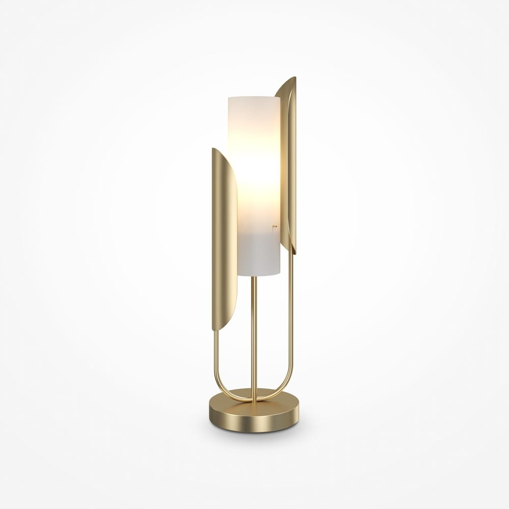 Złota lampa stołowa Cipresso z białym kloszem, o cylindrycznym kształcie, z dekoracyjnymi, zaokrąglonymi elementami. Ustawiona na okrągłej podstawie, emitująca miękkie światło, idealna do nowoczesnych wnętrz.