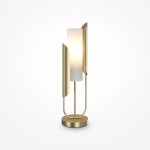 Złota lampa stołowa Cipresso z białym kloszem, o cylindrycznym kształcie, z dekoracyjnymi, zaokrąglonymi elementami. Ustawiona na okrągłej podstawie, emitująca miękkie światło, idealna do nowoczesnych wnętrz.