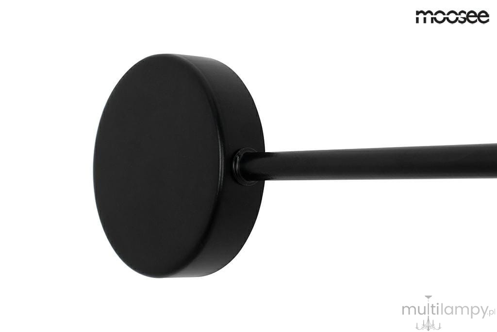 Kinkiet Shadow 2 Close LED, czarny, z okrągłą podstawą i prostym ramieniem. Produkt widoczny z boku, ukazujący gładką, matową powierzchnię oraz minimalistyczny design. Idealny do nowoczesnych wnętrz.