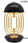Lampa stołowa Bottega 2-punktowa w kolorze złotym i czarnym. Okrągła baza w czerni, a smukła konstrukcja z metalowymi, złotymi elementami tworzy nowoczesny design. Górna część w formie czarnego klosza.