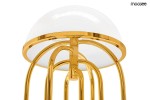 Lampa stołowa Bottega 2-punktowa w kolorze złotym i białym. Okrągła, półprzezroczysta klosz z białego szkła na złotej, metalowej podstawie z eleganckimi, zaokrąglonymi detalami. Ujęcie z góry, ukazujące kształt i materiał.