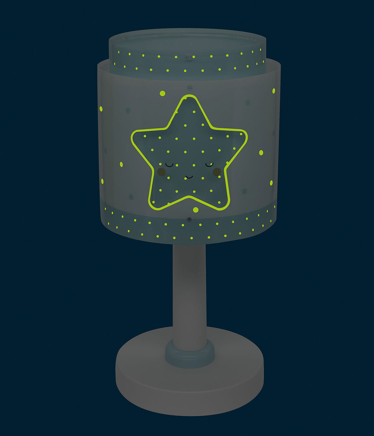 Lampka nocna 1-punktowa w kształcie gwiazdki, z przezroczystym kloszem w szaro-niebieskim kolorze, ozdobiona żółtymi kropkami i uśmiechniętą gwiazdką. Stojąca na okrągłej podstawie, idealna do pokoju dziecięcego.