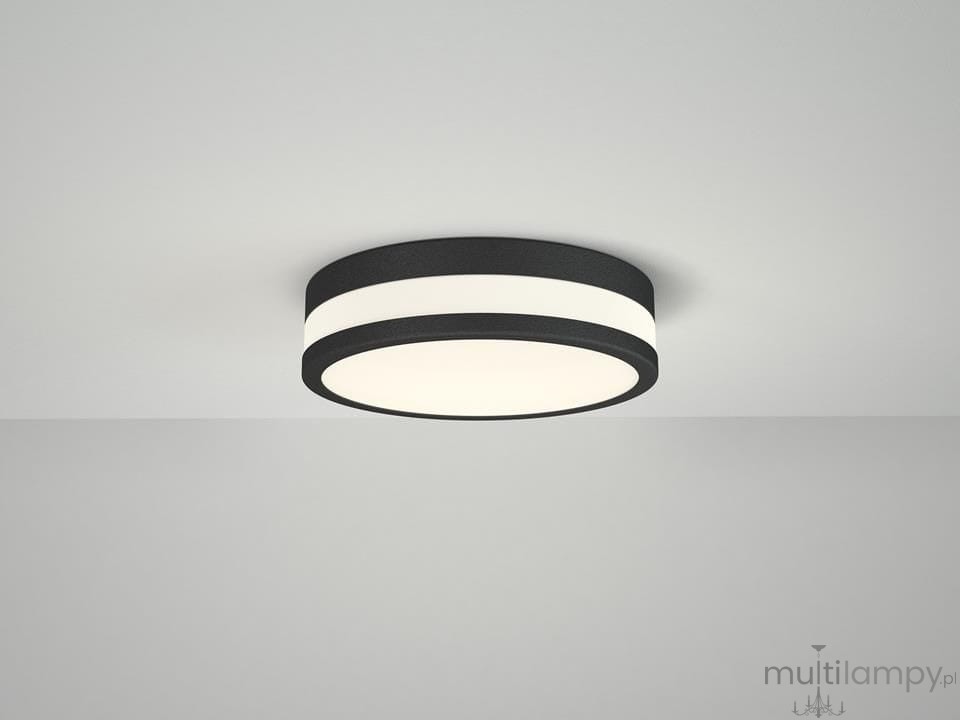Plafon sufitowy Kari 30 LED w kolorze czarnym, o okrągłym kształcie. Zewnętrzna obręcz jest czarna, a wewnętrzna część ma białą oprawę. Lampa zamontowana na gładkim, jasnym suficie.