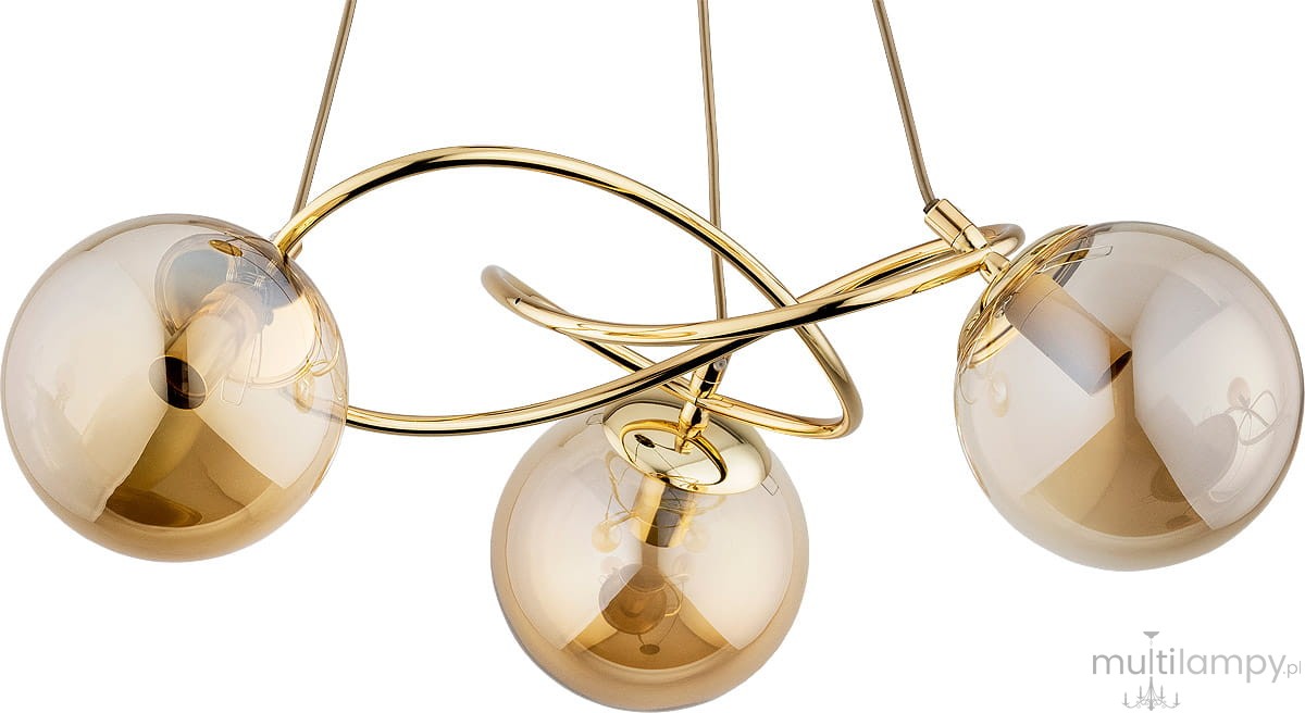 Lampa wisząca Velta 3-punktowa w złotym kolorze, z trzema przezroczystymi kulami, zawieszona na złotych linkach. Okrągły kształt kul oraz stylowy, spiralny element metalowy tworzą nowoczesny wygląd.