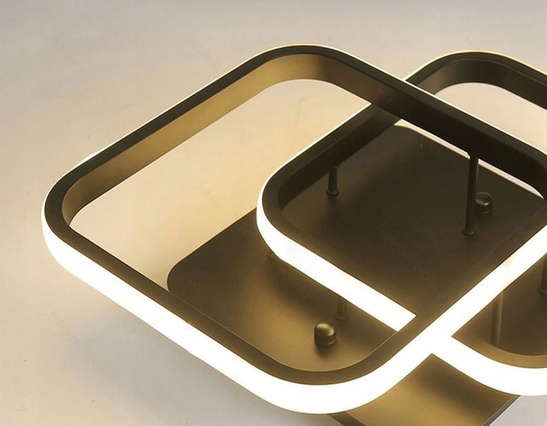 Lampa sufitowa Duore w kolorze czarnym z dwoma źródłami LED o mocy 68W. Posiada nowoczesny, geometryczny kształt z podświetleniem w formie prostokątów. Wyposażona w pilot oraz technologię Bluetooth do zdalnego sterowania.