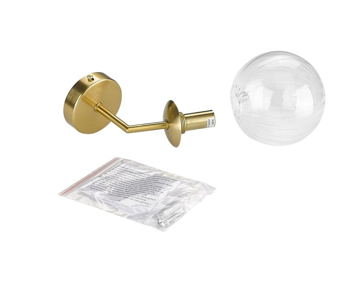 Kinkiet Arette 1xG9 w kolorze złotym z okrągłą, przezroczystą kloszem. Produkt z okrągłą podstawą i metalowym ramieniem. W zestawie instrukcja montażu oraz elementy do instalacji.
