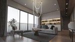 Lampa wisząca Rope Light 1xLED/50W w kolorze złotym, zawieszona w nowoczesnym wnętrzu. Kształt przypominający wstążki, z trzema pętlami. Otoczenie to przestronny salon z sofą, stolikiem kawowym i dużymi oknami.