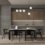 Lampa wisząca Silia 5xG9 w kolorze czarnym i białym, z pięcioma okrągłymi kloszami, zawieszona nad stołem w nowoczesnej kuchni. Tło w odcieniach szarości i drewna, z widocznymi meblami i akcesoriami kuchennymi.