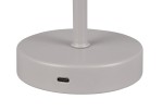 Stołowa lampa Jeff w kolorze szarym z podstawą o okrągłym kształcie. Widoczny port USB-C do ładowania. Produkt ukazany z boku, z bliska na detal podstawy, bez widocznego klosza.