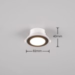 Oprawa do zabudowy Argus RGBW 2xLED/4W+1W w kolorze czarnym. Produkt zamontowany w suficie, z widocznym okrągłym źródłem światła o średnicy 82 mm i wysokości 40 mm. Zdalne sterowanie pilotem.