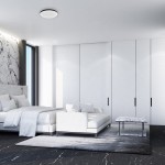 Plafon LED Slimi D37 o mocy 24W i barwie światła 4000K w kolorze czarnym, zamontowany na białym suficie. Produkt umieszczony w nowoczesnej sypialni z jasnymi meblami i marmurowymi akcentami.