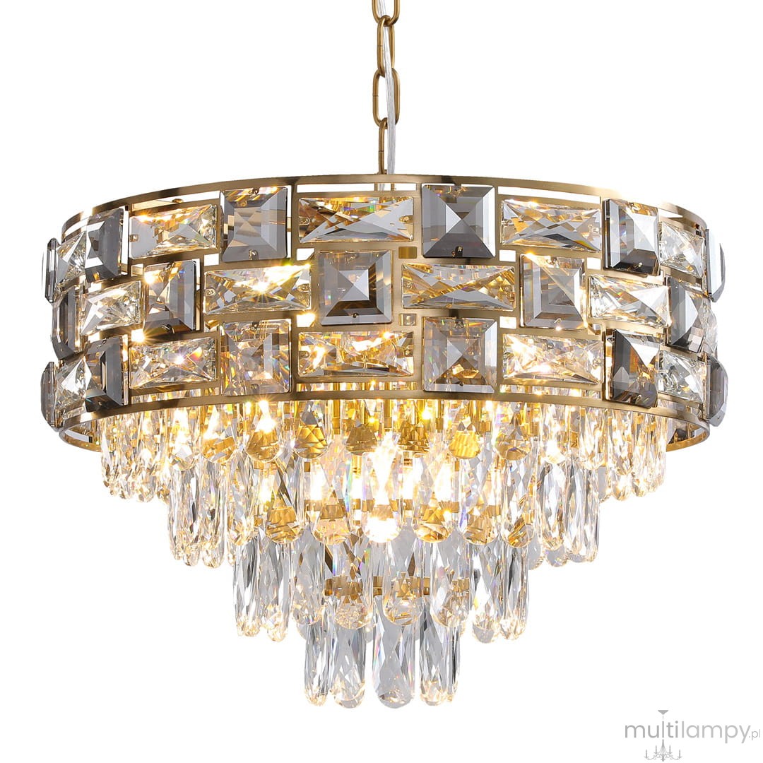 Lampa wisząca Luxuria 9xE14 w kolorze złotym, z dekoracyjnymi kryształkami w kształcie prostokątów i kropli, zawieszona na łańcuchu. Elegancki design, idealna do nowoczesnych wnętrz. Wymiary i detale mogą się różnić.