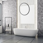 Czarna lampa wisząca Saturno D50 z jednym źródłem LED 25W, IP44. Produkt ma nowoczesny, okrągły kształt, zawieszony w minimalistycznym wnętrzu łazienki z białą wanną i szaro-skalnym tłem.
