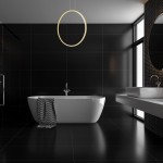Lampa wisząca Saturno D80 w kolorze złotym, o okrągłym kształcie, zawieszona w nowoczesnej łazience. W tle czarne płytki, biała wanna z szarym ręcznikiem. Oświetlenie LED, odporna na wilgoć (IP44).